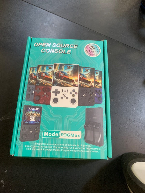 Photo 2 of R36MAX Retro Gaming Console, Retro Handheld Games Console with 64GB TF Card, Portable Hand Held Open Source Linux System, 4.0 inch IPS HD Screen Video Game Consoles, 4000mAh Battery,Transparent Red