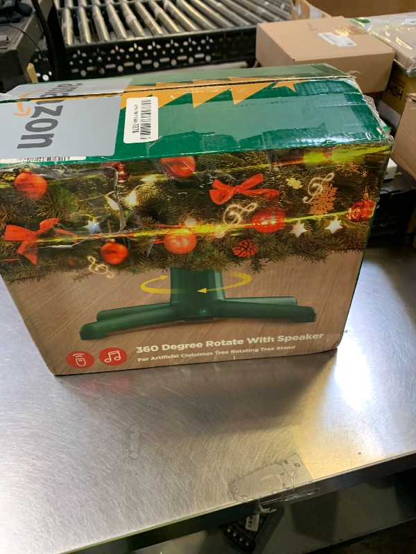 Photo 1 of ?Patent Pending? Musical Rotating Christmas Tree Stand, UL Certified Up to 9ft 120 lb Artificial Christmas Tree with Speaker, Spinning Stand with Remote, Fit for 1.25-2" in Tree Poles - 800W
