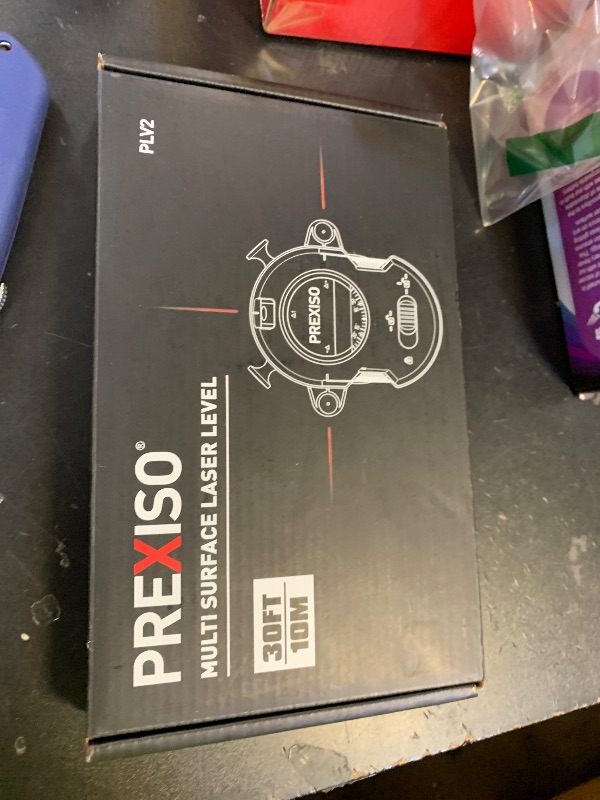 Photo 1 of PREXISO Multi Surface Laser Level LED Light Vial, 30Ft Horizontal & Vertical Line Laser with Wall Mount Base, 2 Pins, 10 Sticker, 2 AA Batteries for Hanging Frames & Picture, Construction Wall Writing