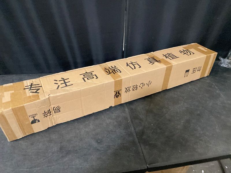 Photo 1 of Artificial Palm Tree, 4FT Tall Decorative Fake Palm Tree in Pot with with Natural Trunks Real Touch Leaves, UV Sun Resistant Tropical Floor Faux Plant for Office Patio Yard Home Decor