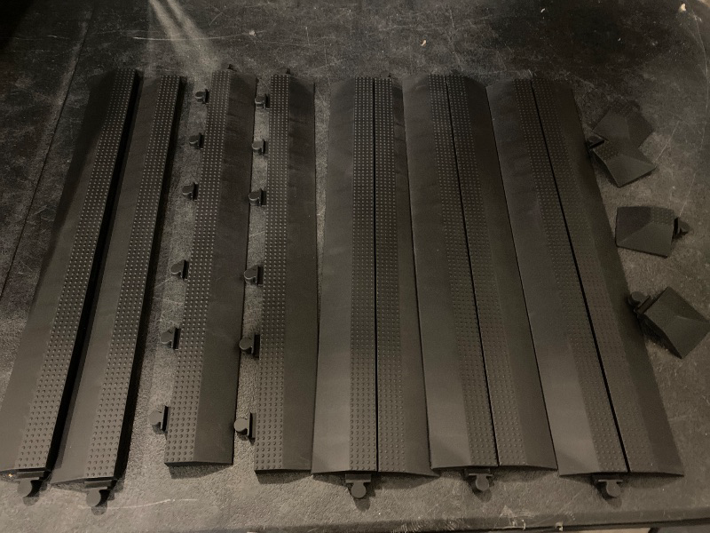 Photo 1 of Interlocking Floor Tile Trim Pieces - Beveled Edges and Corners - Durable ½ in TPE (Rubber Like, NOT Foam, no Odor) - Black, 10 Edges and 4 Corners