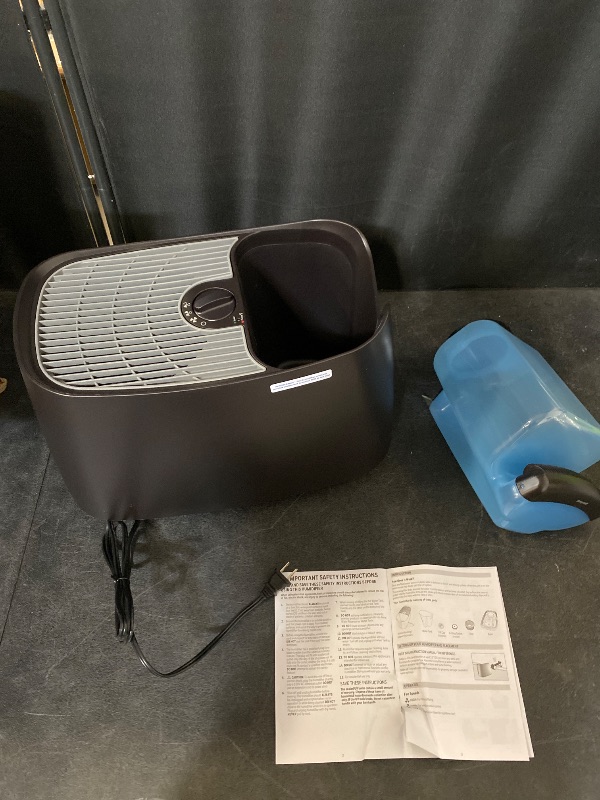 Photo 1 of Honeywell Cool Moisture Humidifier For Bedroom, Medium Rooms, 1.1 Gallon, Invisible Moisture Humidifier for Baby, Kids, Quiet, Easy to Clean, UV Technology, Black, HCM350B