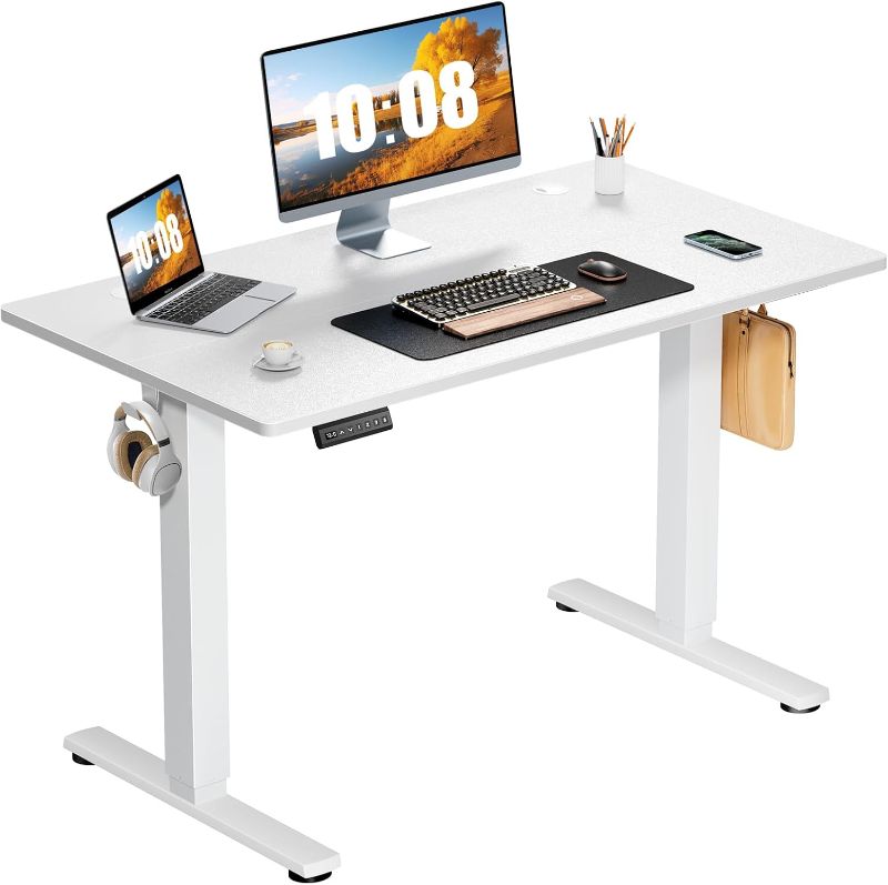 Photo 1 of Electric Standing Desk Adjustable Height, 40x24 Inch Sit Stand Up Home Office Desks Computer Workstation PC Work Table with 3 Memory Preset Splice Wood Board Metal Frame, White