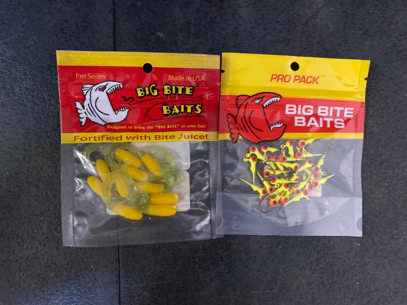 Photo 1 of Big Bite Triple Tip Grub 2" 10ct Yellow Chartreuse Shiner + Big Bite Baits 1/32 oz. Round Ball Jigheads 25-Pack Orange/Chart