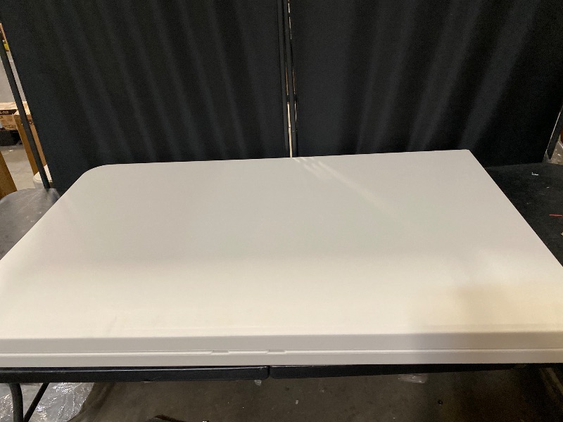 Photo 1 of 4ft Plastic Folding Table, Indoor Outdoor Collapsible Portable Dining Table w/Handle, Ideal for Picnic Party Camping, White