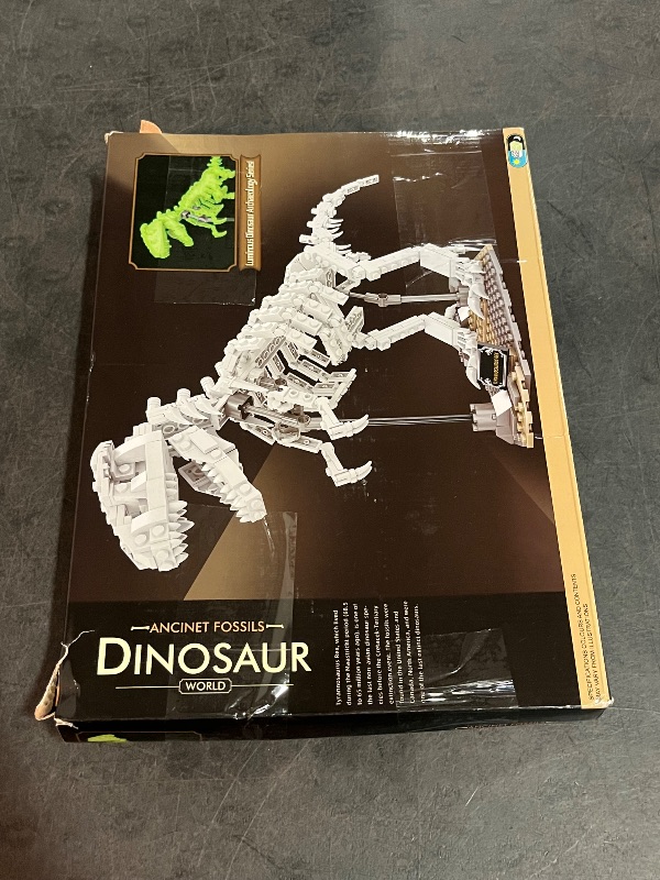 Photo 1 of FERURE Dinosaur Fossils Building Set, Creative Tyrannosaurus Skeleton Building Toys with Bracket for Boys & Girls 14+, Dino Toys Glow in The Dark, Office/Home Decoration (435 Pieces)
