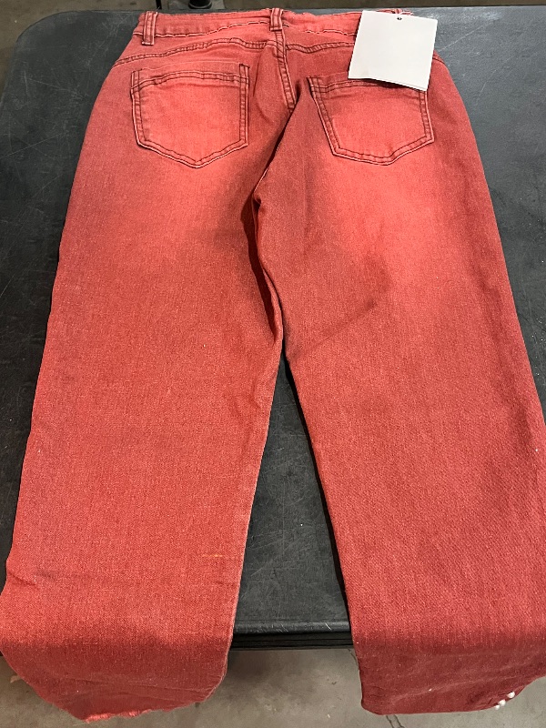 View 4 of (M) Womens Straight Legged Jeans with a Raw Hem and Pearl Detailing on the Ankle Cuff - Red