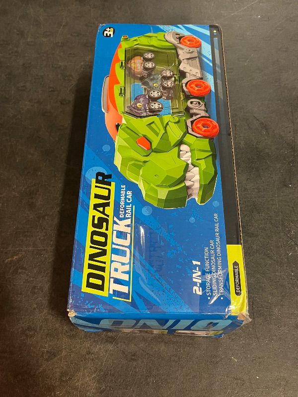 Photo 1 of Dinasour Transporter Truck Foldable Sliding Race Track with Dinosaur Cars