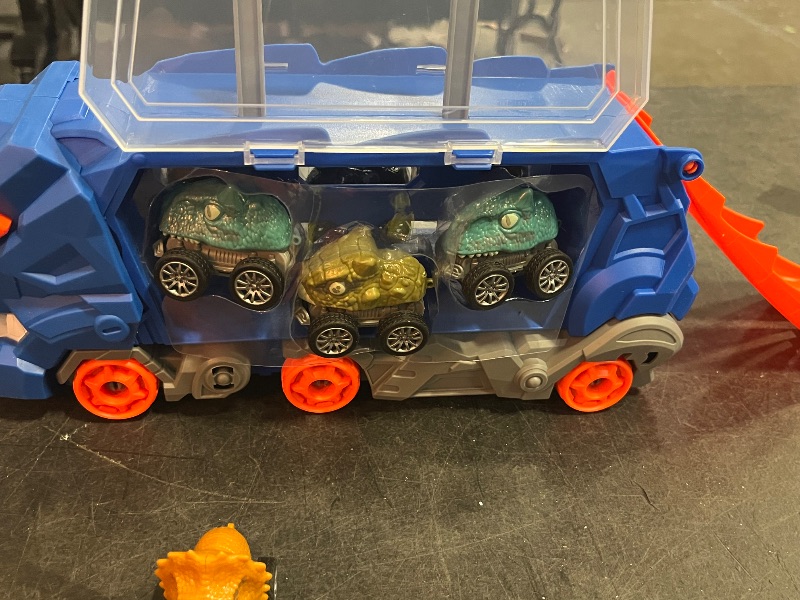 Photo 1 of Dinasour Transporter Truck Foldable Sliding Race Track with Dinosaur Cars