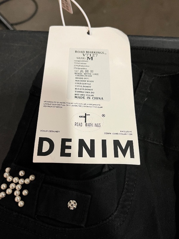 Photo 1 of (M) Womens Skinny Legged Black Denim Jeans with Diamond Pattern on Front Pockets and Ribboned on Back Pockets