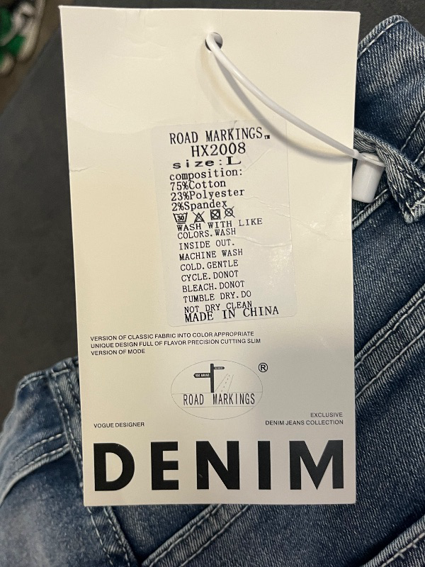 Photo 1 of (L) Womens Denim Shorts with Rigged Bottoms and Designs on Back 