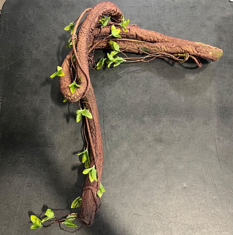 Photo 1 of Bendable Artificial Vines with Green Leaves, Fake Thick Vine Stems and Tree Branches for Home Decor, Artificial Tree Twigs Branches for Outdoor Garden Wall Hanging
