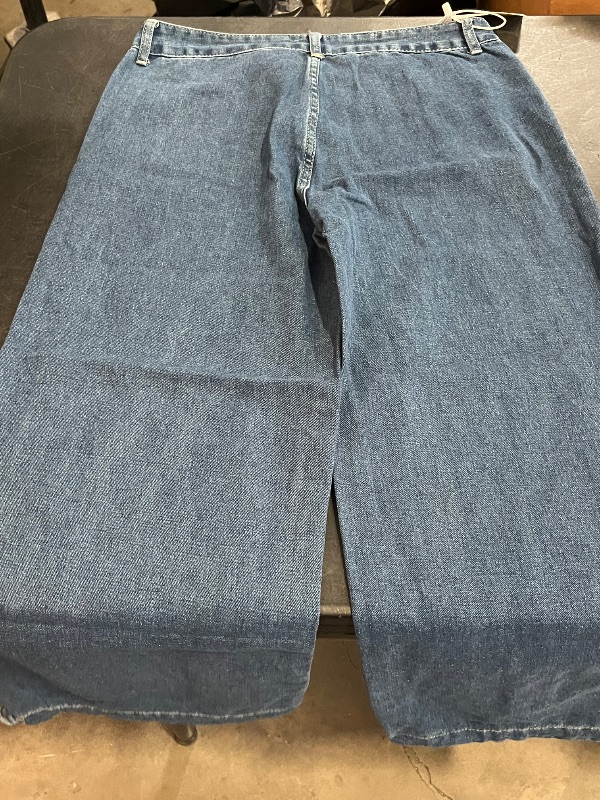 Photo 1 of (L) Womens Denim Jeans with OverLapped Pockets in Front and Tie on Bottom Leg, Wide Leg, Medium Wash Jeans 