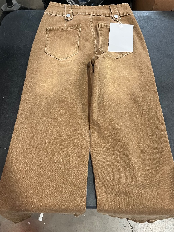 Photo 1 of (M) Cinnamon-Colored High-Waisted Flared Jeans for Women Featuring a Multi-Button Closure, Side Splits, And Button Details That Enhance The Shape of The Butt. These Jeans Embody a Classic, Trendy Vintage Style Suitable for Daily Wear, Office Commutes