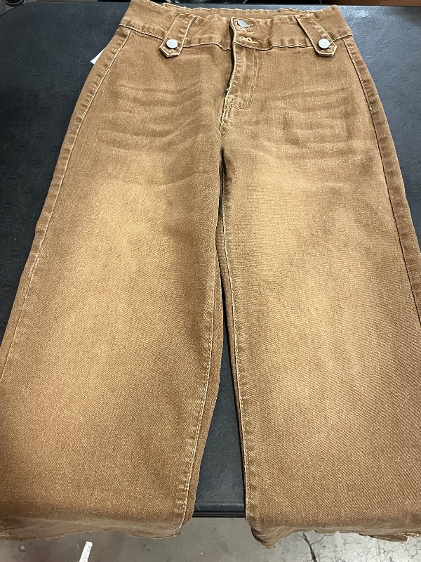 Photo 1 of (M) Cinnamon-Colored High-Waisted Flared Jeans for Women Featuring a Multi-Button Closure, Side Splits, And Button Details That Enhance The Shape of The Butt. These Jeans Embody a Classic, Trendy Vintage Style Suitable for Daily Wear, Office Commutes