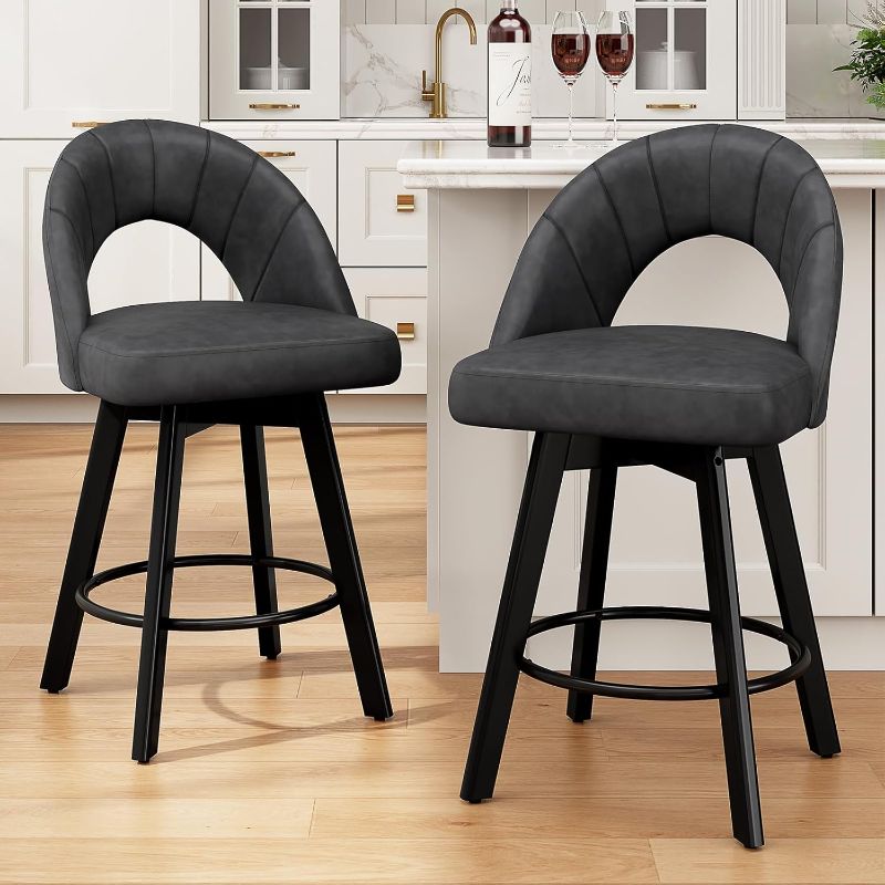 Photo 1 of Bar Stools Set of 2, 24” Swivel Counter Height Barstool with PU Leather Upholstered Seat, Hollow Curved Back, Solid Wood Legs & Metal Footrest, Kitchen Island Chairs for Dining Room, Charcoal Gray