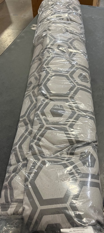 Photo 1 of Reversible 2-Person Quilted Hammock w/ Spreader Bars, Pillow, & Hanging Hardware | 55-in. Wide | Weather Resistant | 450 Lb. Capacity