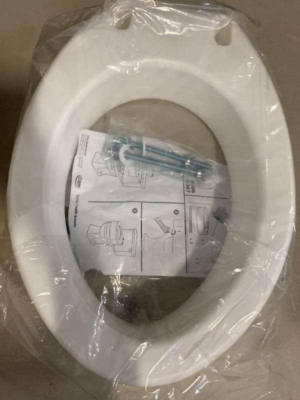 Photo 1 of Carex Toilet Seat Riser, Elongated Raised Toilet Seat Adds 3.5 inches to Toilet Height, for Assistance Bending or Sitting, 300 Pound Weight Capacity Toilet Riser