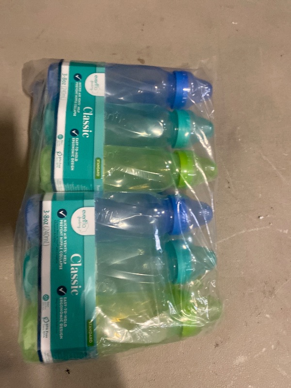 Photo 1 of Evenflo Feeding Classic Tinted Plastic Standard Neck Bottles for Baby, Infant and Newborn - Teal/Green/Blue, 8 Ounce (Pack of 12)