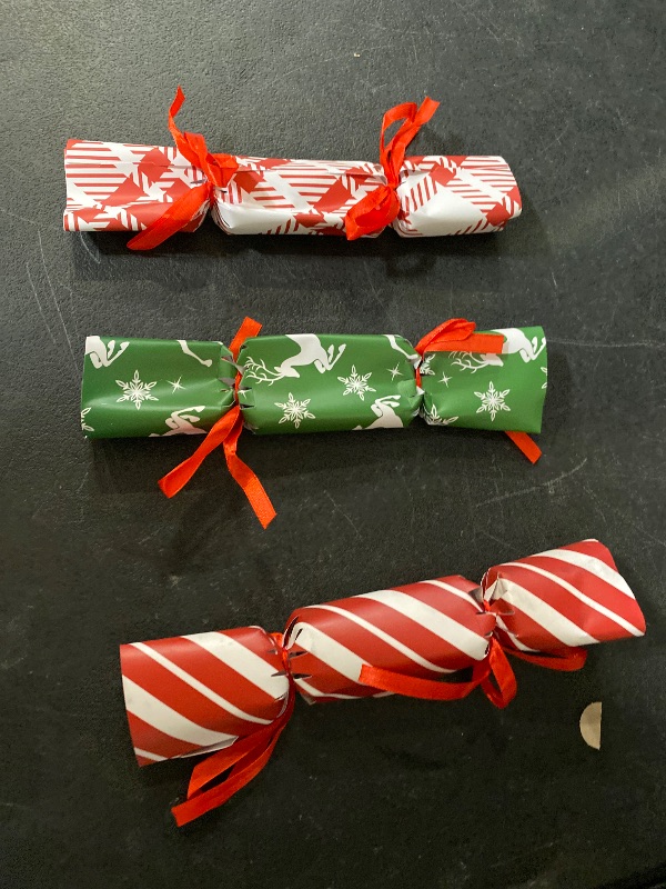 Photo 1 of CCINEE 12 Packs Christmas No-snap Party Table Favors, Party Poppers with Prizes for Xmas Gifts for Holiday Prize