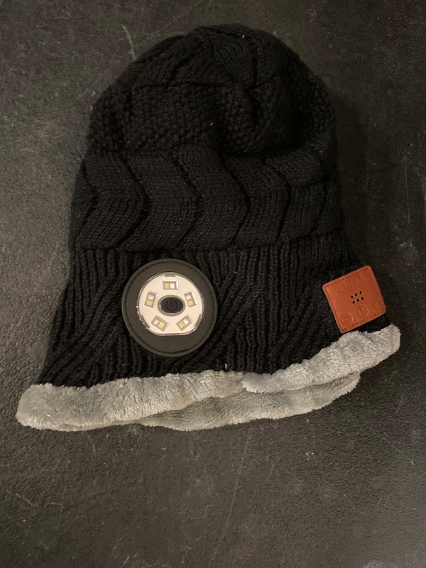 Photo 1 of Bluetooth Beanie with a Light, Unisex USB Rechargeable Winter Hat with 4 LED Headlamp & Wireless Headphones, Unique Christmas Stocking Stuffers & Birthday Gifts for Men, Husband, Teens Dark Black