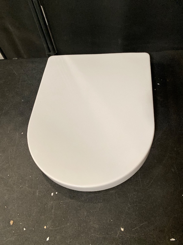 Photo 1 of D/U Shape Toilet Seat,Soft Close and Quick-Release for Easy Cleaning Toilet Seats Cover,Stable Hinge Design to prevent shifting -White Elongated Toilet Lid