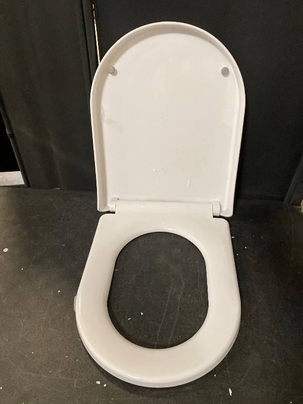 Photo 1 of D/U Shape Toilet Seat,Soft Close and Quick-Release for Easy Cleaning Toilet Seats Cover,Stable Hinge Design to prevent shifting -White Elongated Toilet Lid