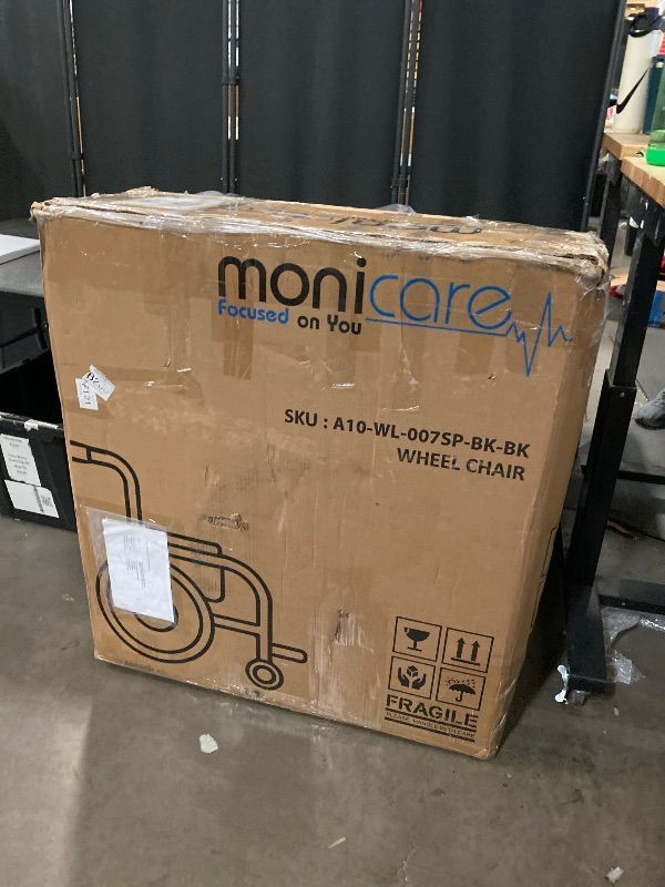 View 3 of Monicare Wide Foldable Bariatric Wheelchair for Adult 500-lbs Heavy-Duty Folding Transport Self-Propelled Wheel Chair with 24-Inch Seat