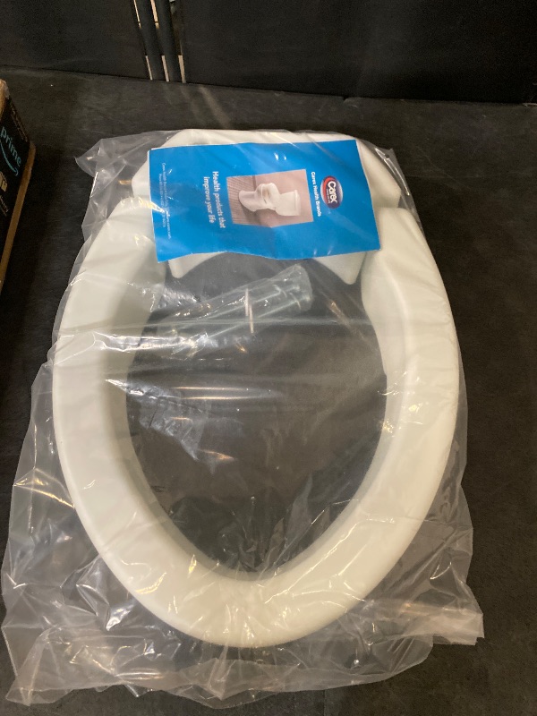 Photo 1 of Carex Health Brands Hinged Elongated Toilet Seat Riser, Adds 3.5 Inches of Height to Toilet, 300 Pound Weight Capacity, Raised Toilet Seat, White (FGB32100 0000)