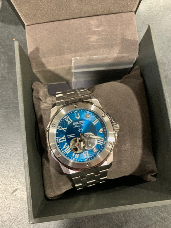 Photo 1 of Bulova Marc Anthony Men's Automatic Marine Star Stainless Steel Watch,Open Aperture,Exhibition Case Back,Diamond Accent Blue Sunray Dial, (Model:98D184)