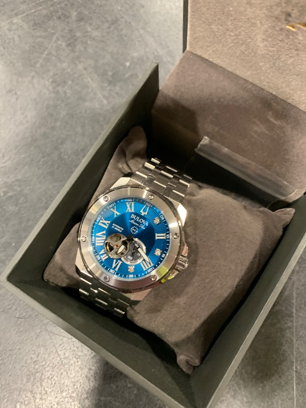 Photo 1 of Bulova Marc Anthony Men's Automatic Marine Star Stainless Steel Watch,Open Aperture,Exhibition Case Back,Diamond Accent Blue Sunray Dial, (Model:98D184)