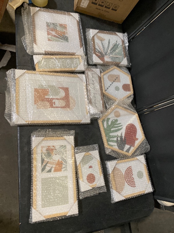 Photo 1 of Artbyhannah 8 Pack Abstract Gallery Wall Picture Frame Set with Decorative Botanical Plant Art Prints for Home Wall Decor, Multi-Size: 11x14, 8x10, 6x8 inch