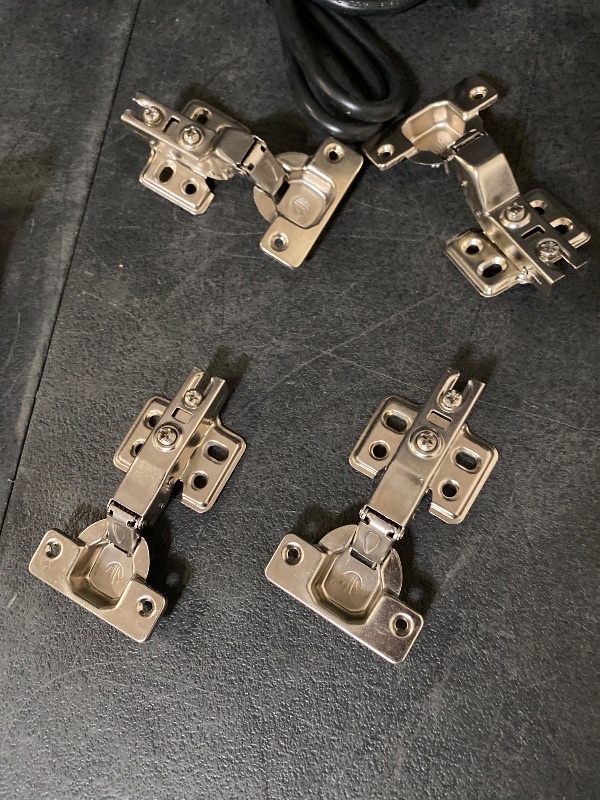 Photo 1 of Parts from cabinet hinges W/ Gold handles