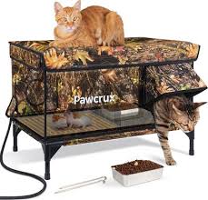 Photo 1 of Pawcrux Outdoor Heated Cat House with High-Quality Heating Pad Waterproof Indestructible High Load-Bearing in Black Camouflage&Army Green One-Way Escape Door with Ground Nails Ideal for Barn Cats Courtyard Cats and Outdoor Cats