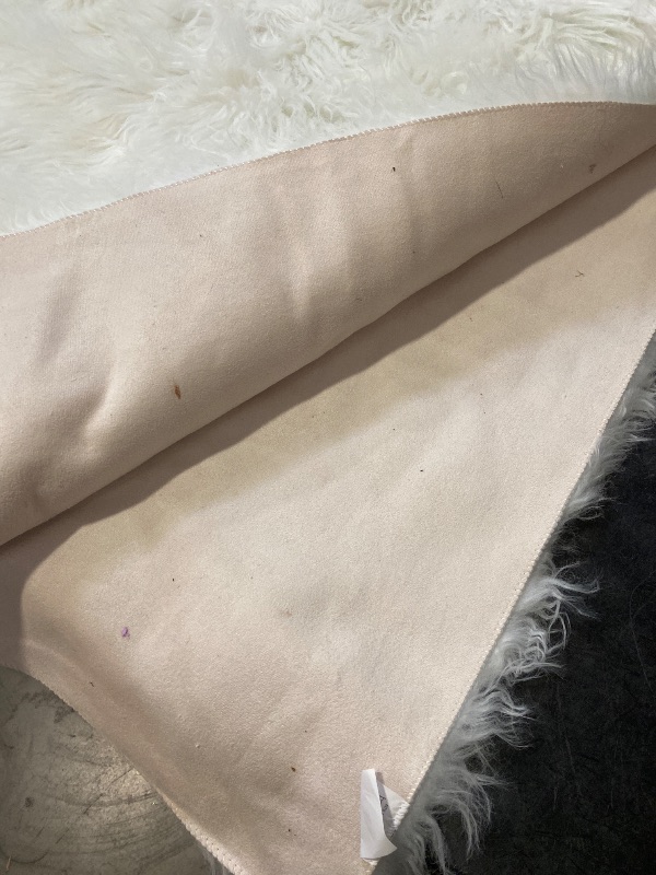 Photo 1 of Silky Soft Faux Fur Shaggy Rug, 8 ft. x 10 ft. White Fluffy Sheepskin Area Carpet, Rectangle Shape for Living Room, Bedroom, Kid's Room, or Nursery, Machine Washable with Non-Slip Backing