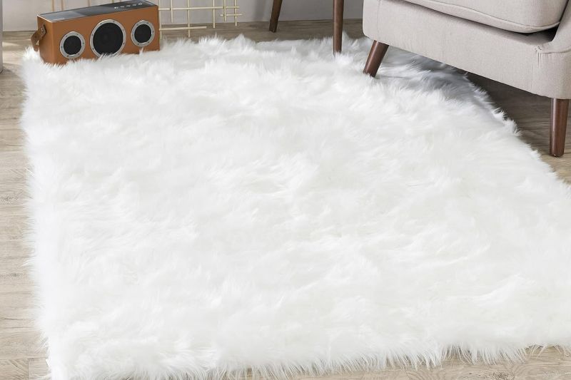 Photo 1 of Silky Soft Faux Fur Shaggy Rug, 8 ft. x 10 ft. White Fluffy Sheepskin Area Carpet, Rectangle Shape for Living Room, Bedroom, Kid's Room, or Nursery, Machine Washable with Non-Slip Backing