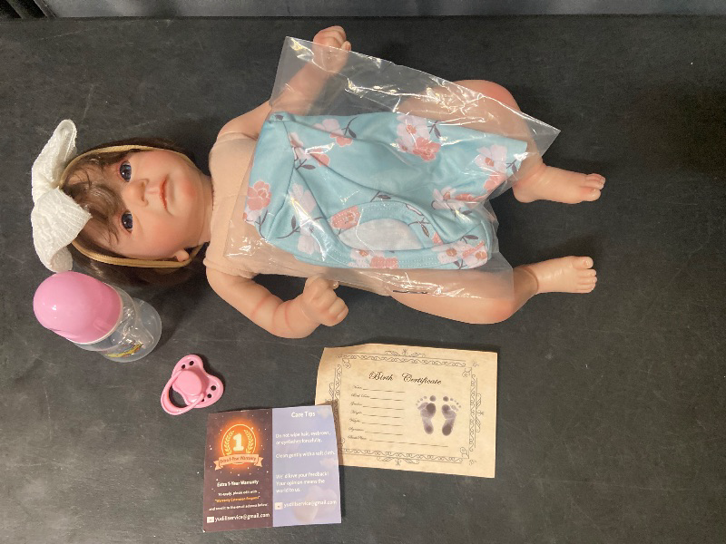 Photo 1 of Reborn Baby Doll 22 Inch Lifelike Newborn Gentle-Touch Silicone Vinyl Weighted Body Deluxe Fiber Hair