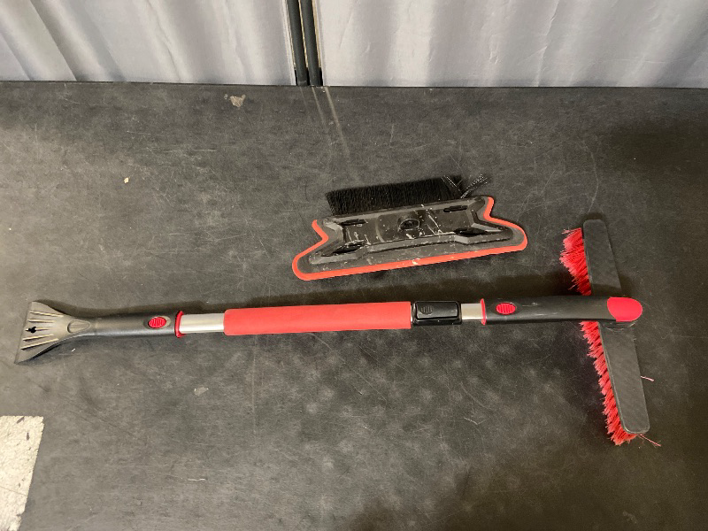 Photo 1 of Bigfoot 60" Telescoping Snow broom and Ice Scraper - One Touch Pivoting Head and Enhanced Foam Grip