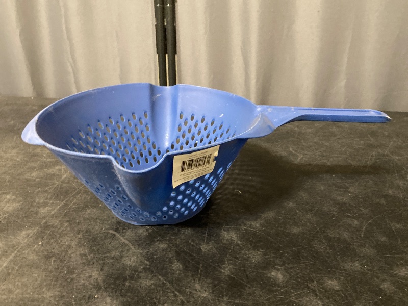 Photo 1 of Blue plastic vegetable strainer it has two pour sides and two-hole sizes to drain