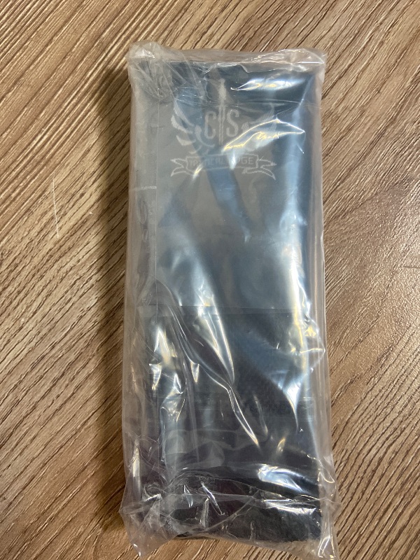 Photo 1 of Black CTS Tactical Edge nylon sheath features a secure snap closure for holding small tools or folding knives.