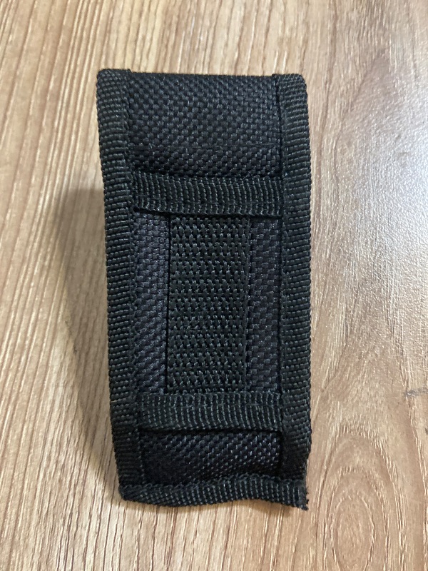 Photo 1 of *3.5in Outdoor Edge multi-use holster is constructed from durable nylon, Sheaths Knife Pouch