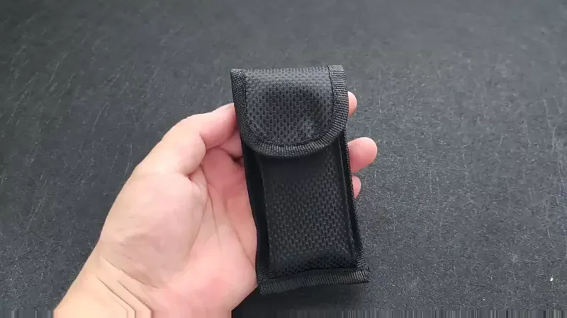 Photo 1 of *3.5in Outdoor Edge multi-use holster is constructed from durable nylon, Sheaths Knife Pouch
