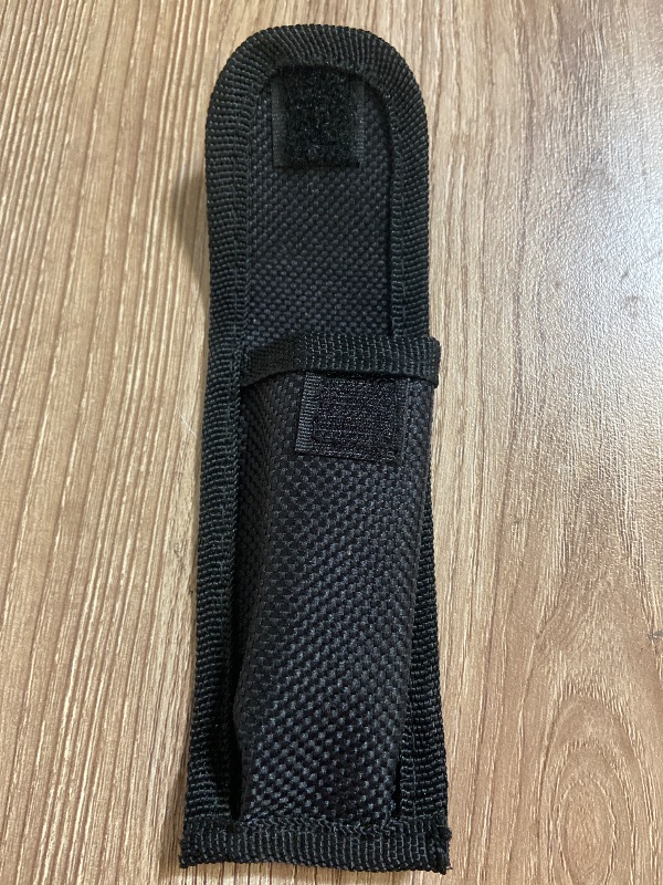 Photo 1 of *3.5in Outdoor Edge multi-use holster is constructed from durable nylon, Sheaths Knife Pouch