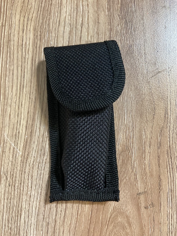 Photo 1 of *3.5in Outdoor Edge multi-use holster is constructed from durable nylon, Sheaths Knife Pouch