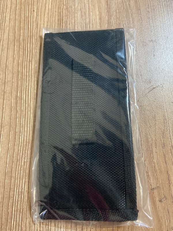 View 5 of Black tactical pouch resembles a Galls molded nylon holder typically used for pepper spray and utility pouches