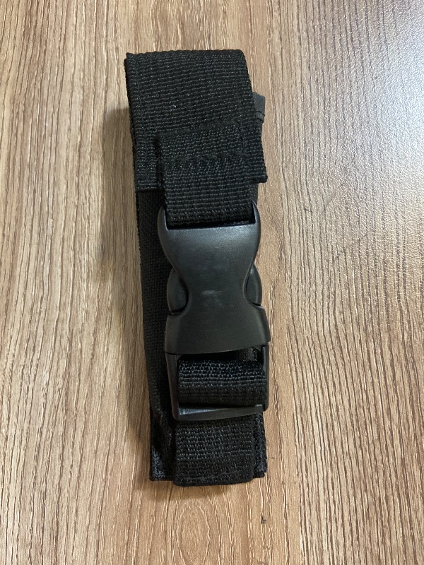 Photo 1 of Black nylon sheath typically designed for a folding knife or multi-tool