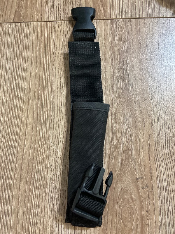 Photo 1 of Black nylon sheath typically designed for a folding knife or multi-tool