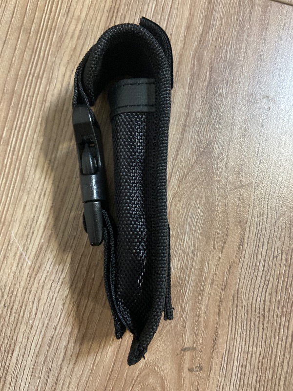 Photo 1 of *5inx1in Black nylon knife sheath featuring a plastic quick-release buckle and an integrated belt loop on the back