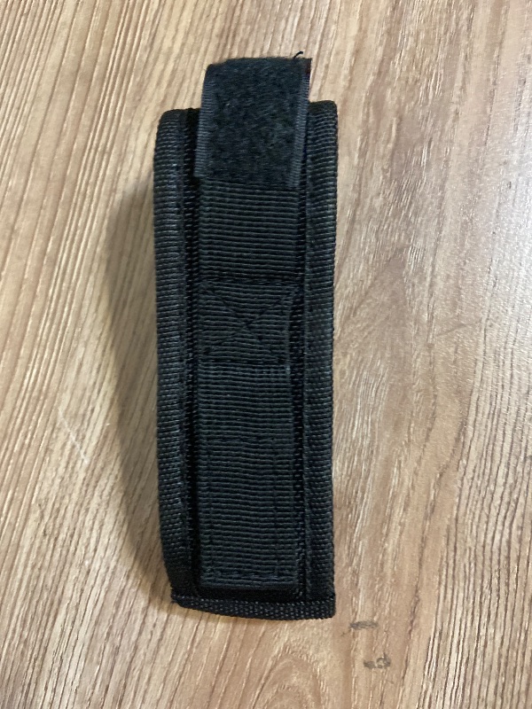 Photo 1 of *5inx1in Black nylon knife sheath featuring a plastic quick-release buckle and an integrated belt loop on the back