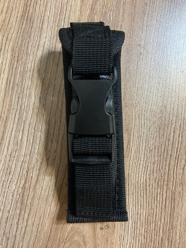 Photo 1 of *5inx1in Black nylon knife sheath featuring a plastic quick-release buckle and an integrated belt loop on the back